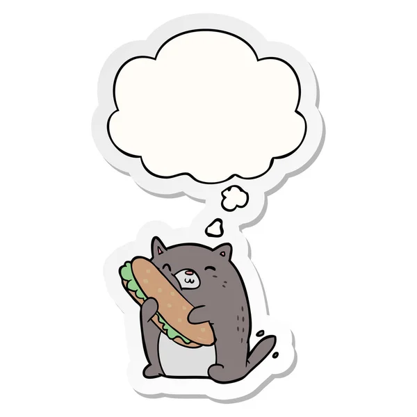 Cartoon cat with sandwich and thought bubble as a printed sticke — Stock Vector