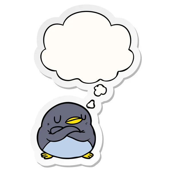 Cartoon penguin and thought bubble as a printed sticker — Stock Vector