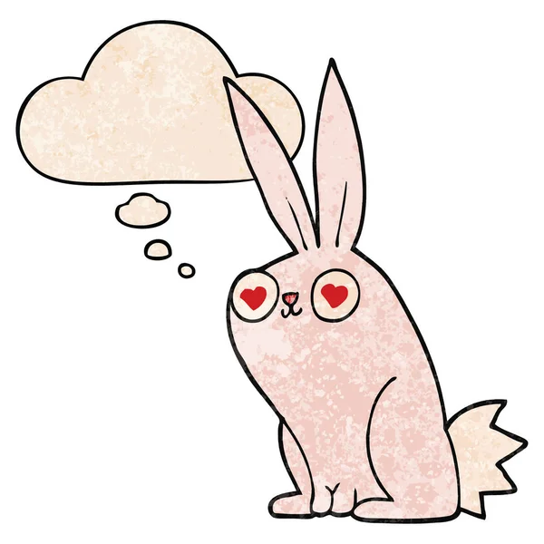 Cartone animato coniglio coniglio in amore e bolla di pensiero in grunge textur — Vettoriale Stock