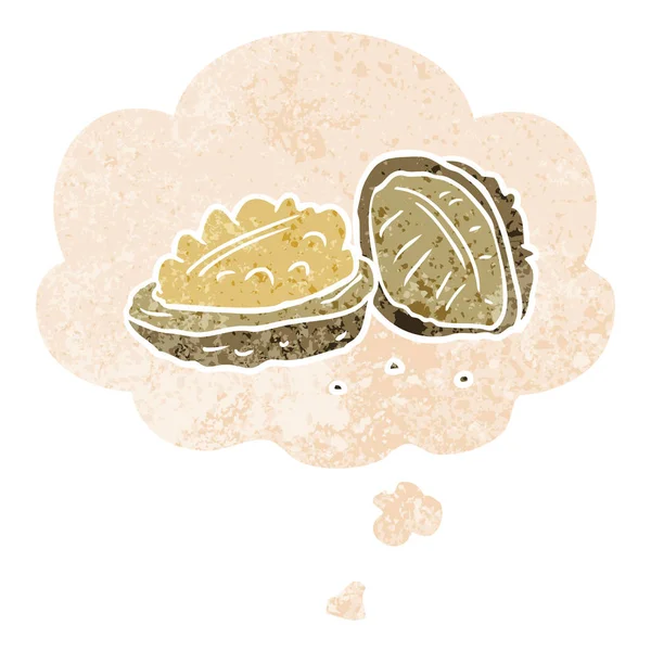 Nueces de dibujos animados y burbuja de pensamiento en estilo texturizado retro — Vector de stock