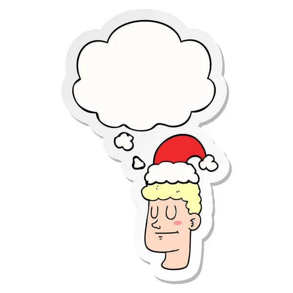 Homme dessin animé portant chapeau de Noël et bulle de pensée comme un printe — Image vectorielle