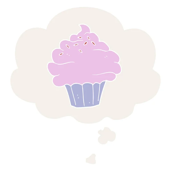 Cupcake dos desenhos animados e bolha de pensamento em estilo retro — Vetor de Stock