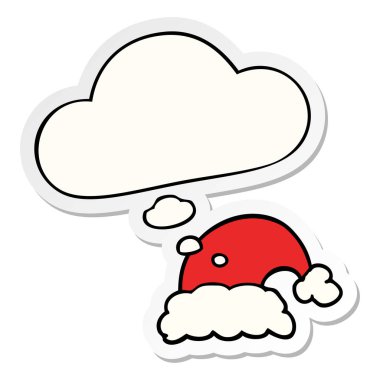 karikatür noel şapka ve baskılı bir etiket olarak kabarcık düşünce