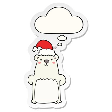 karikatür ayı noel şapkası giyen ve bir baskı olarak kabarcık düşünce