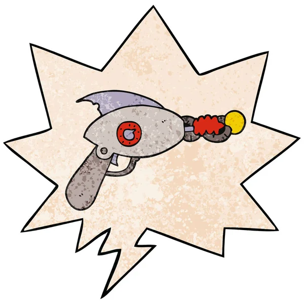Pistola de rayos de dibujos animados y burbuja de habla en estilo de textura retro — Vector de stock