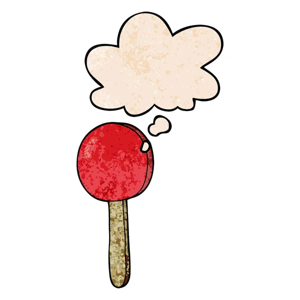 Cartoon Lollipop en gedachte bubble in grunge textuur patroon St — Stockvector