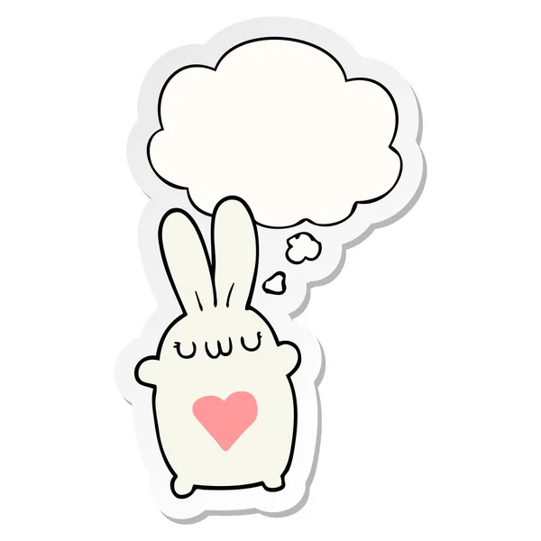 Cute cartoon rabbit with love heart and thought bubble as a prin — Stock Vector