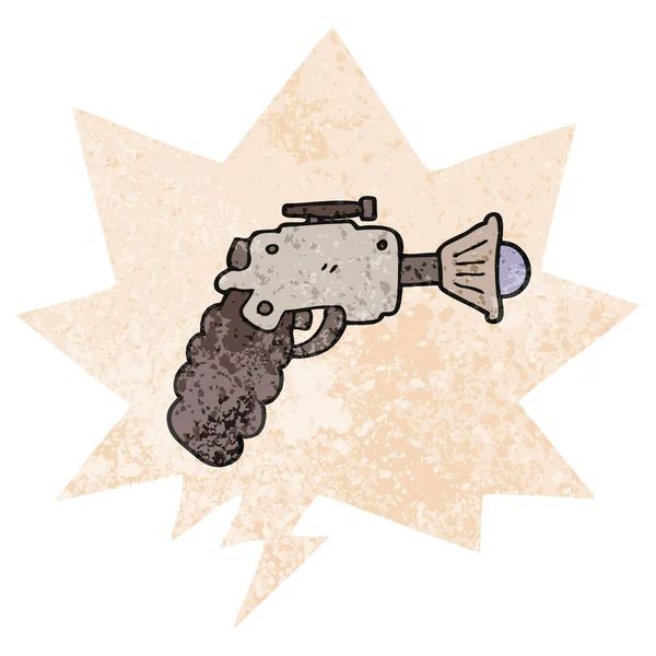 Cartoon ray gun e bolha de fala em estilo retro texturizado — Vetor de Stock