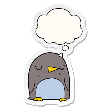 karikatür penguen ve baskılı bir etiket olarak kabarcık düşünce