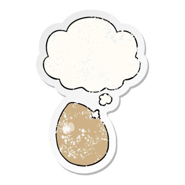karikatür yumurta ve sıkıntılı yıpranmış etiket olarak kabarcık düşünce