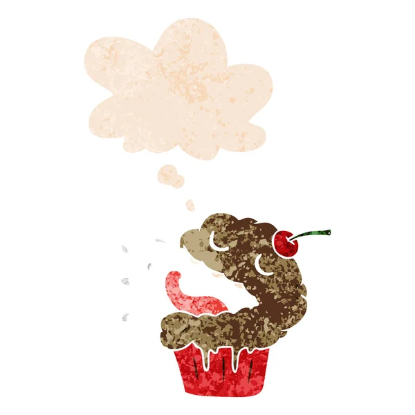 Cupcake de dibujos animados y burbuja de pensamiento en estilo texturizado retro — Vector de stock