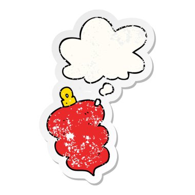 bir sıkıntılı yıpranmış olarak karikatür noel bauble ve düşünce balonu