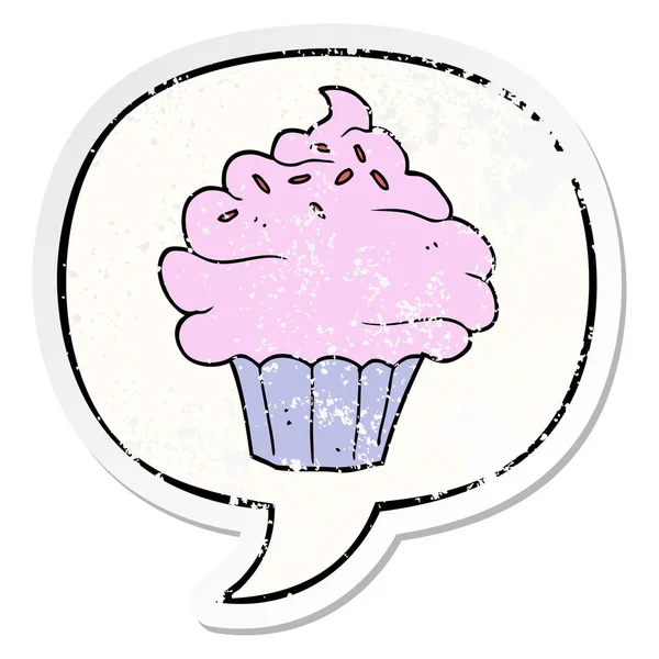 Cartoon cupcake and speech bubble distressed sticker — Stock Vector
