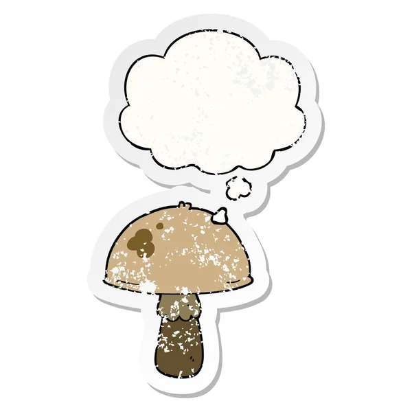 Cartoon mushroom and thought bubble as a distressed worn sticker — Stock Vector