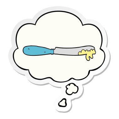 karikatür tereyağı bıçak ve baskılı bir etiket olarak kabarcık düşünce