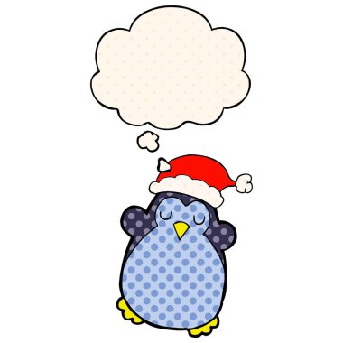 sevimli noel penguen ve çizgi roman tarzında kabarcık düşünce