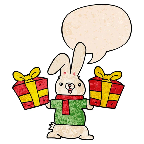 卡通兔子和圣诞礼物和在复古的语音泡沫 — 图库矢量图片