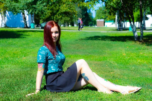 Girl Sitting Green Grass Background Trees — Stock Fotó