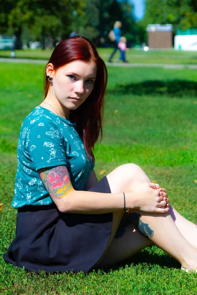 Girl Sitting Green Grass Background Trees — Stock Fotó