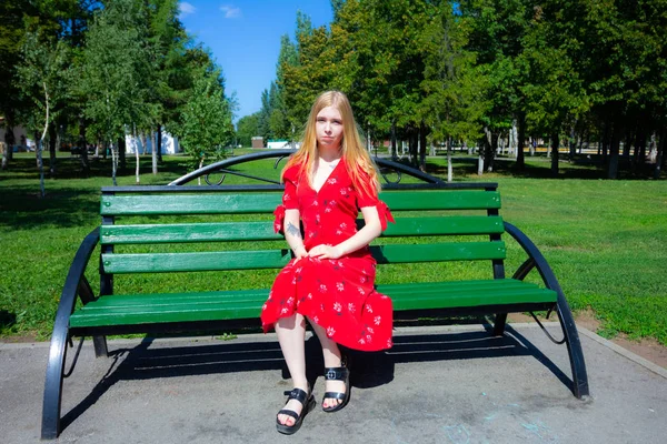 Girl Sitting Green Grass Background Trees — Stock Fotó