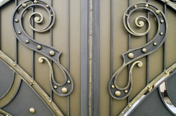 Decorative elements of metal forged gates