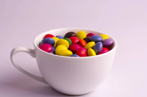 Multi Colored Dragee White Cup — Stock Photo, Image