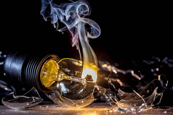 Amazing Explosion Burning Light Bulb Splinters Broken Glass Smoke Isolate — Stock Photo, Image