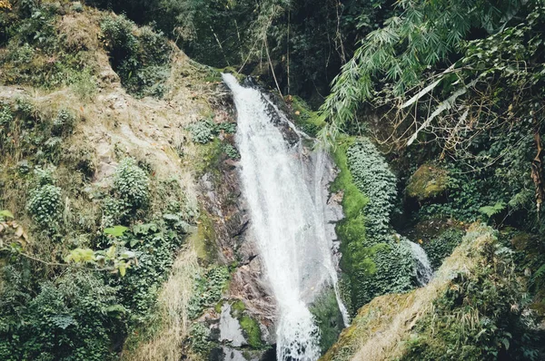 Butterfly Waterfalls or Seven Sisters Waterfalls with mountain view close up, on way to Lachung Gangtok Sikkim surrounded by Deep forest and cascade. Fall changes direction seven times looks beautiful