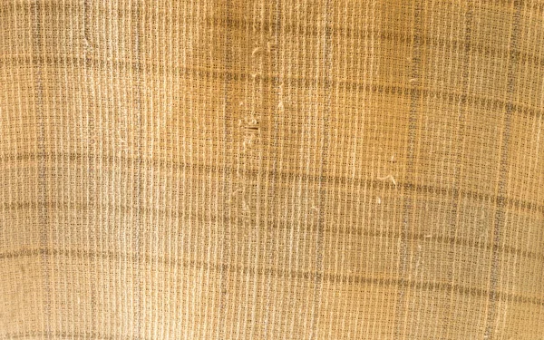 Close up de textura de tecido amassado, pano de linho fundo têxtil de tecido leve com onda Crisscross. Fundo padrão de lona natural. Estúdio filmado com espaço de cópia para tex. — Fotografia de Stock