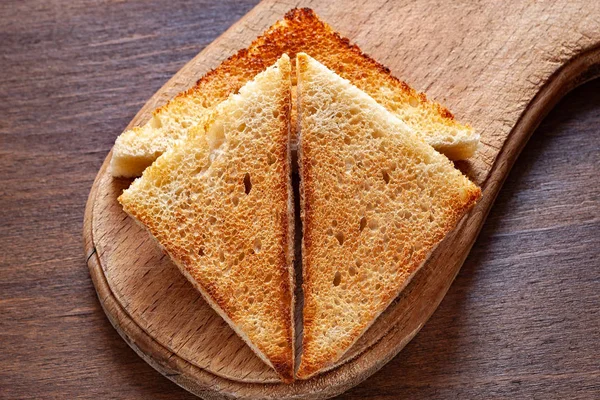 Toast Auf Einem Holzuntergrund — Stockfoto