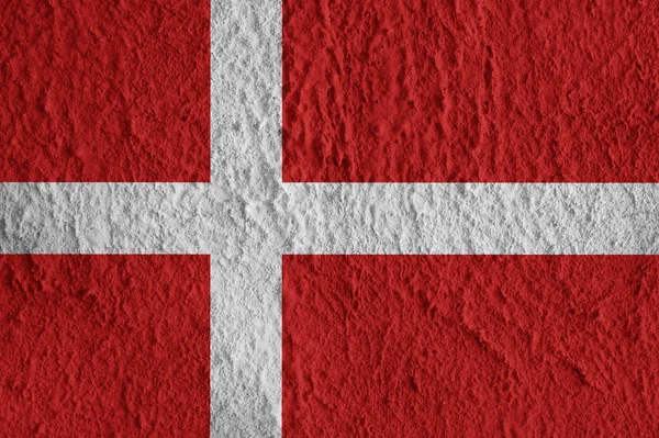 Σημαία Δανίας στην επιφάνεια του σκυροδέματος. Δημιουργική ταπετσαρία για την εγκατάσταση και σχεδιασμό. — Φωτογραφία Αρχείου