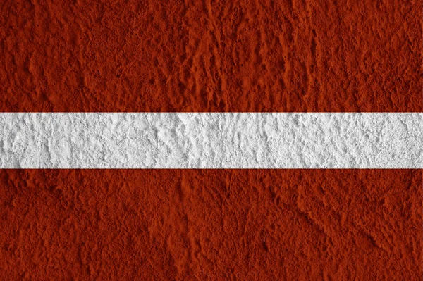Lettország zászlaja a Beton felület. Kreatív tapéta és design. — Stock Fotó