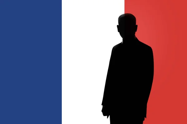 Silueta podnikatel na pozadí francouzské vlajky. Silueta muže, s prostorem pro text. — Stock fotografie