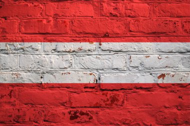 Tuğla duvar arka plan Avusturya bayrağı.