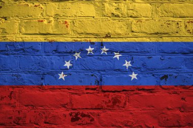 Tuğla duvar zemin üzerine Venezüella bayrağı.