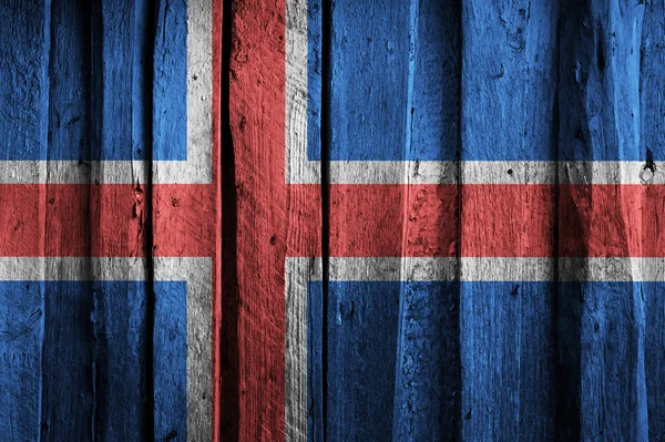 오래 된 나무 판자의 배경에 아이슬란드 깃발. — 스톡 사진