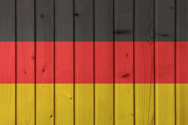 Bandiera della Germania sullo sfondo di tavole di legno. Carta da parati per installazione e design. Spazio per testo . — Foto Stock