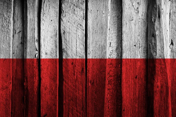 Lengyel zászló a háttérben a régi fa deszka. — Stock Fotó