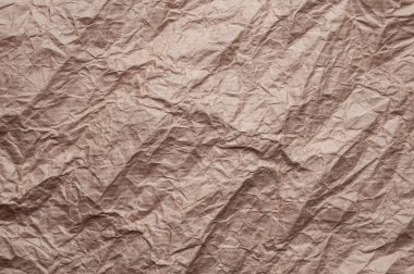 Buruşuk kraft kağıt. Doku buruşuk geri dönüşümlü eski kahverengi kağıt.