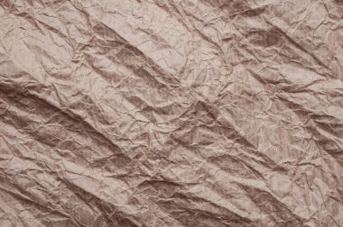 Buruşuk kraft kağıt. Doku buruşuk geri dönüşümlü kahverengi kağıt.