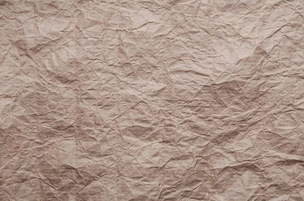 Crumpled kraft paper. Texture crumpled recycled old brown paper. — Stock Photo, Image