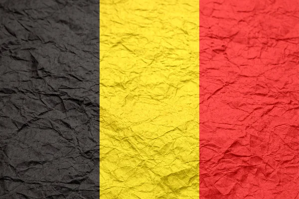 Belgium flag on old crumpled craft paper. — Stock Photo, Image