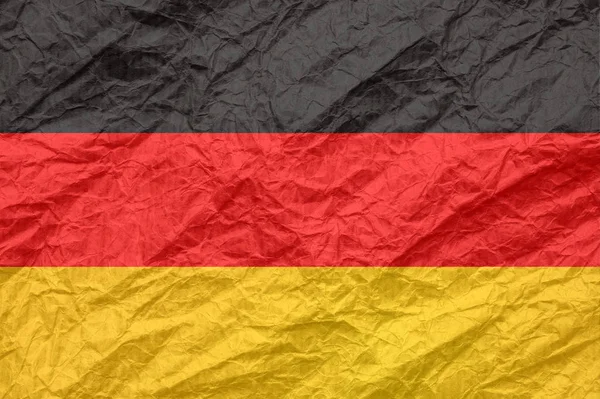 Γερμανία σημαία σε παλιό τσαλακωμένο χαρτί χειροτεχνίας. — Φωτογραφία Αρχείου