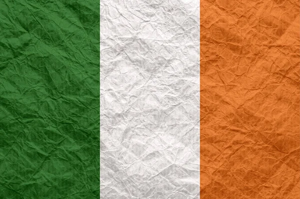 Ireland flag on old crumpled craft paper. — Stock Photo, Image