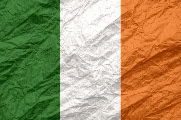 Ireland flag on old crumpled craft paper. — Stock Photo, Image