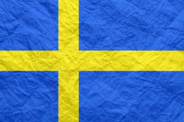 Eski buruşturulmuş zanaat kağıt üzerinde İsveç bayrağı. 
