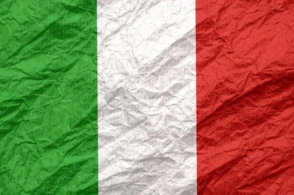 Bandera de Italia sobre papel viejo y arrugado . — Foto de Stock
