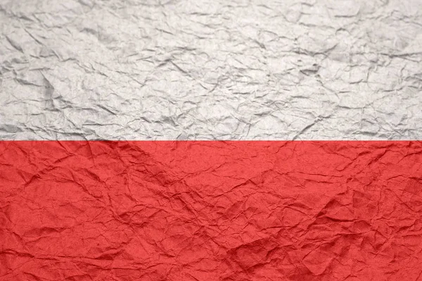 Polen vlag op oude verfrommeld ambachtelijke papier. — Stockfoto