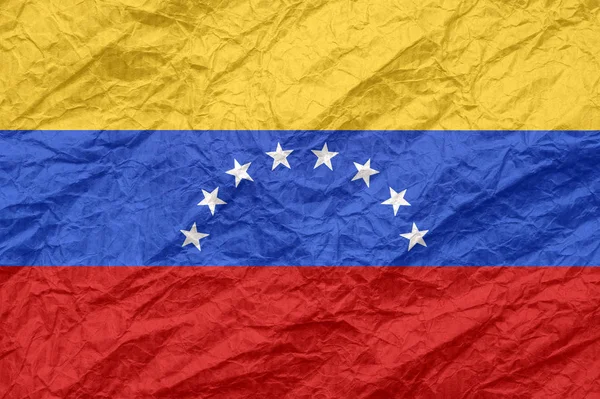 Venezuela zászlója a régi gyűrött kézműves papír. — Stock Fotó