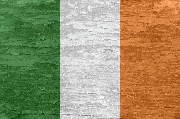 Ireland flag on an old painted wooden surface. — Stock Photo, Image